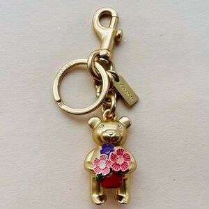 Coach Gold-tone Bear Keychain with Pink & Purple Flower Accents